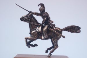 dragone a cavallo in bronzo massiccio su base in legno di ciliegio
